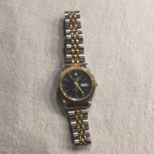 Seiko Jewelry - Black and gold watch Seiko Jewelry - Black and gold watch